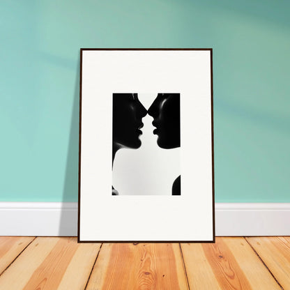 Framed black and white silhouette artwork of profiles from Shadowed Sédual Symphony