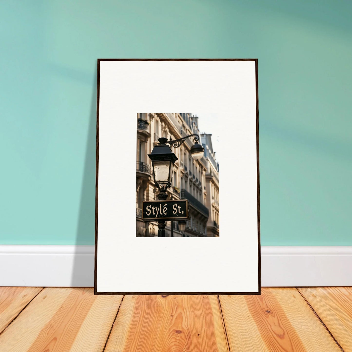 Framed wall art of a Parisian street sign and lamp post for stylish room decoration