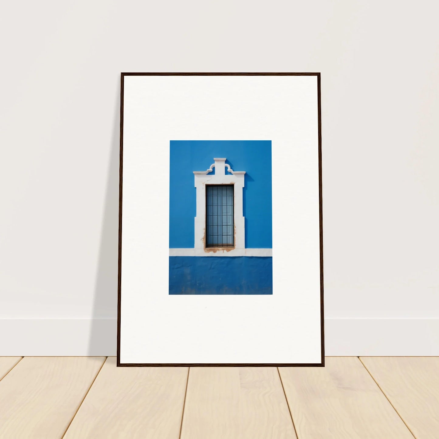 Framed wall art featuring a white-trimmed window on a blue wall in Liquid Azure Quest