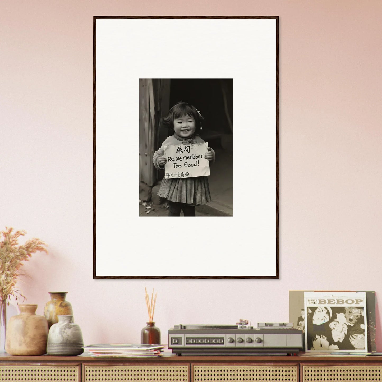 Framed black and white photo of a child with a sign, perfect for Ephemeral Joy Imbibed