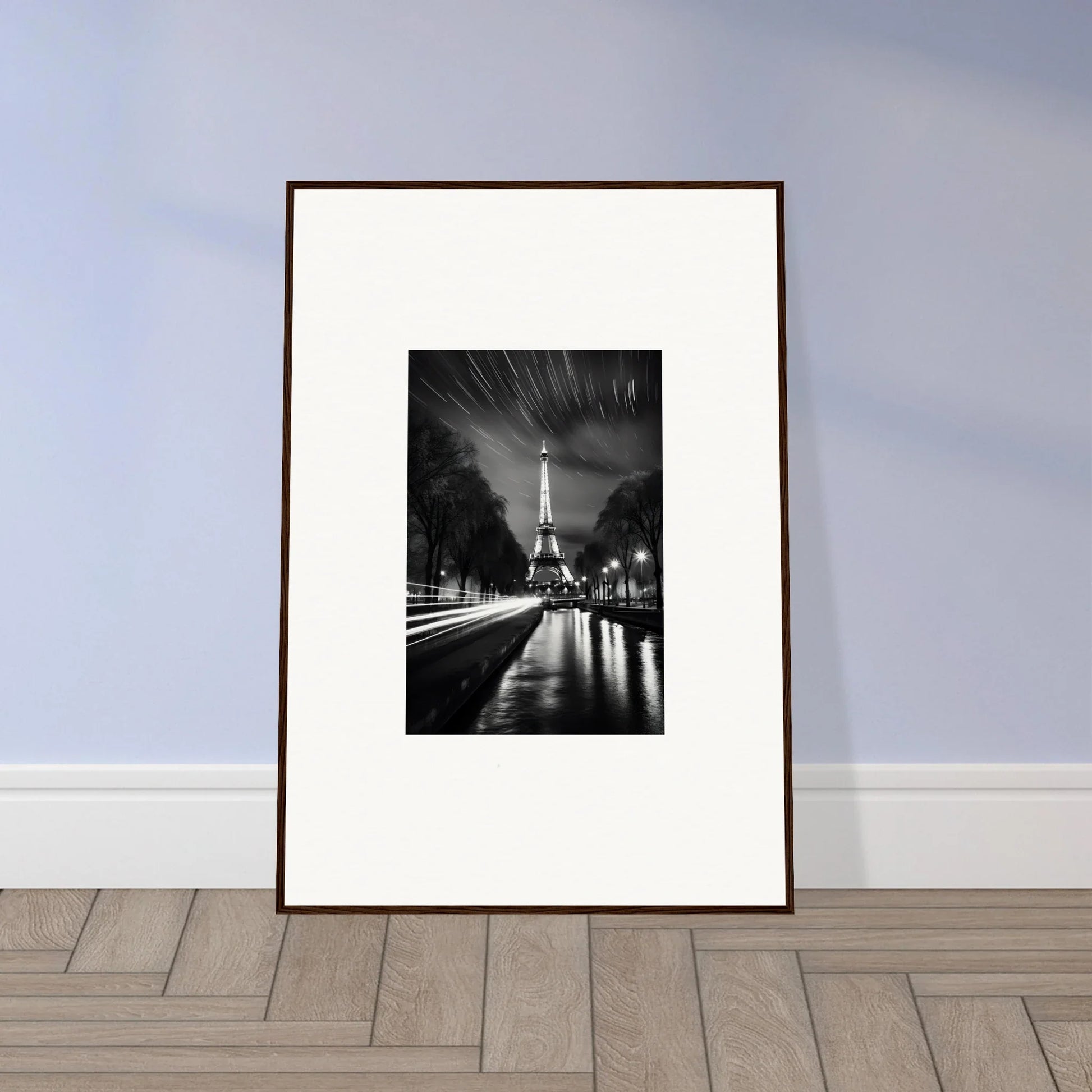 Framed black and white Eiffel Tower photo with water reflections from Parisian Stars