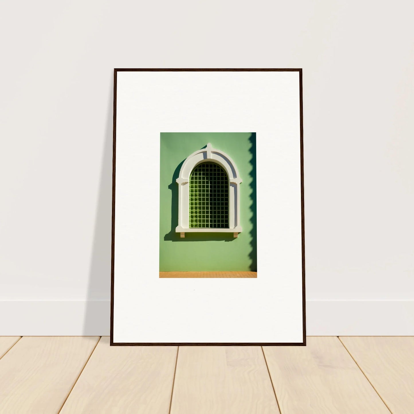 Framed photograph of a stylish arched green window with metalwork for Visible Equilibrium Window