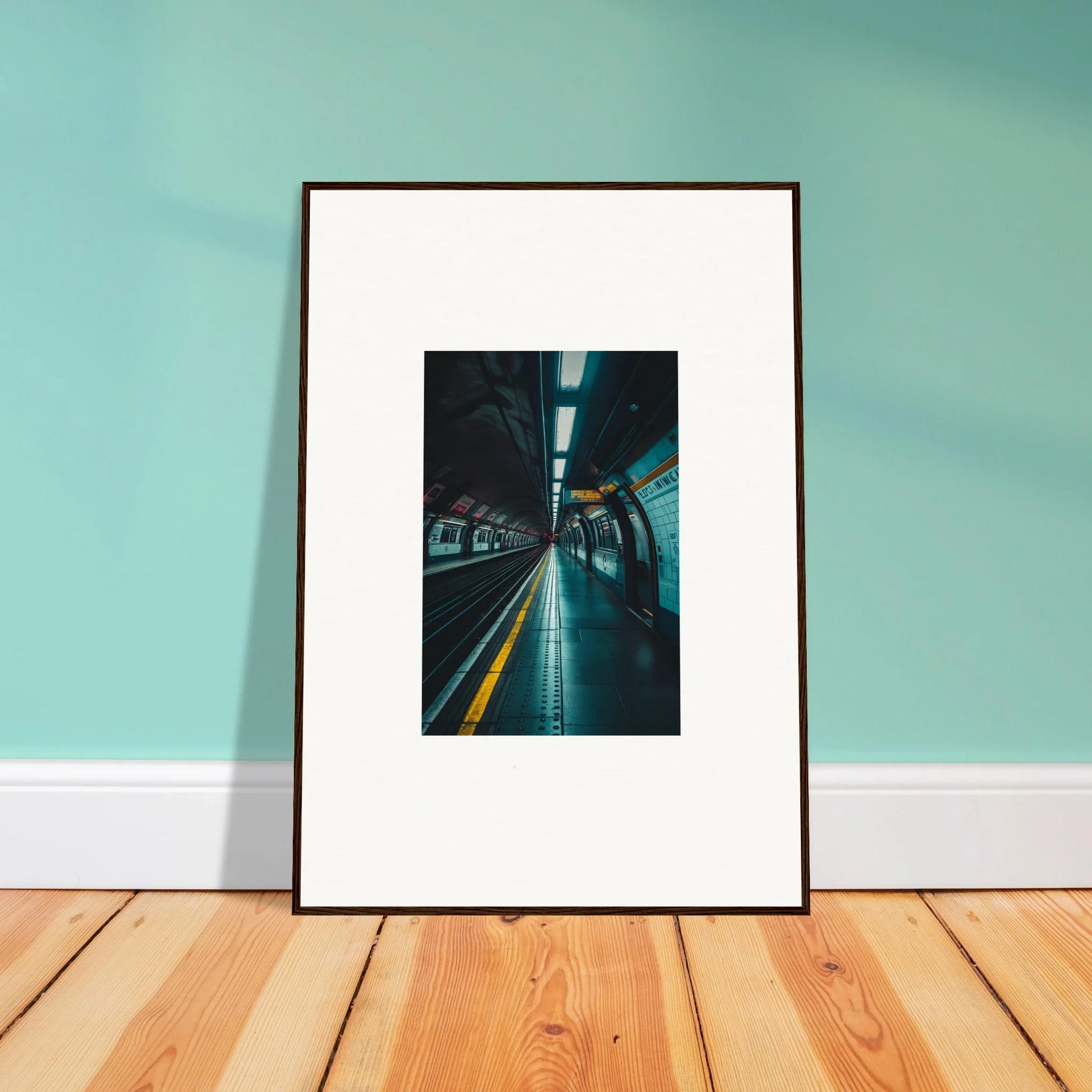 Framed photograph of subway tunnel with yellow markings in Portal Echo Anatomy art