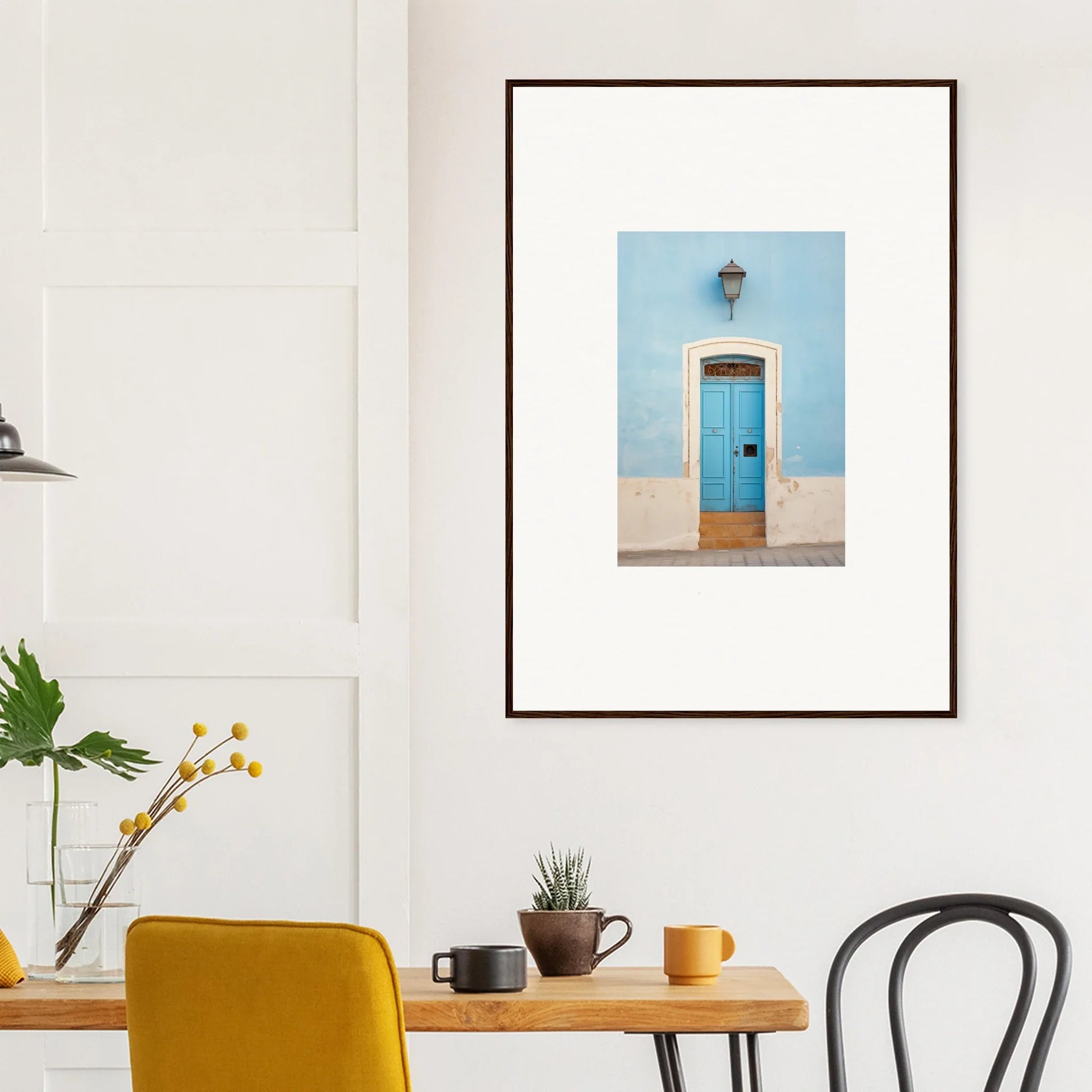 Framed wall art of a bright blue door on a light wall from Surreal Azure Vesaurrezz