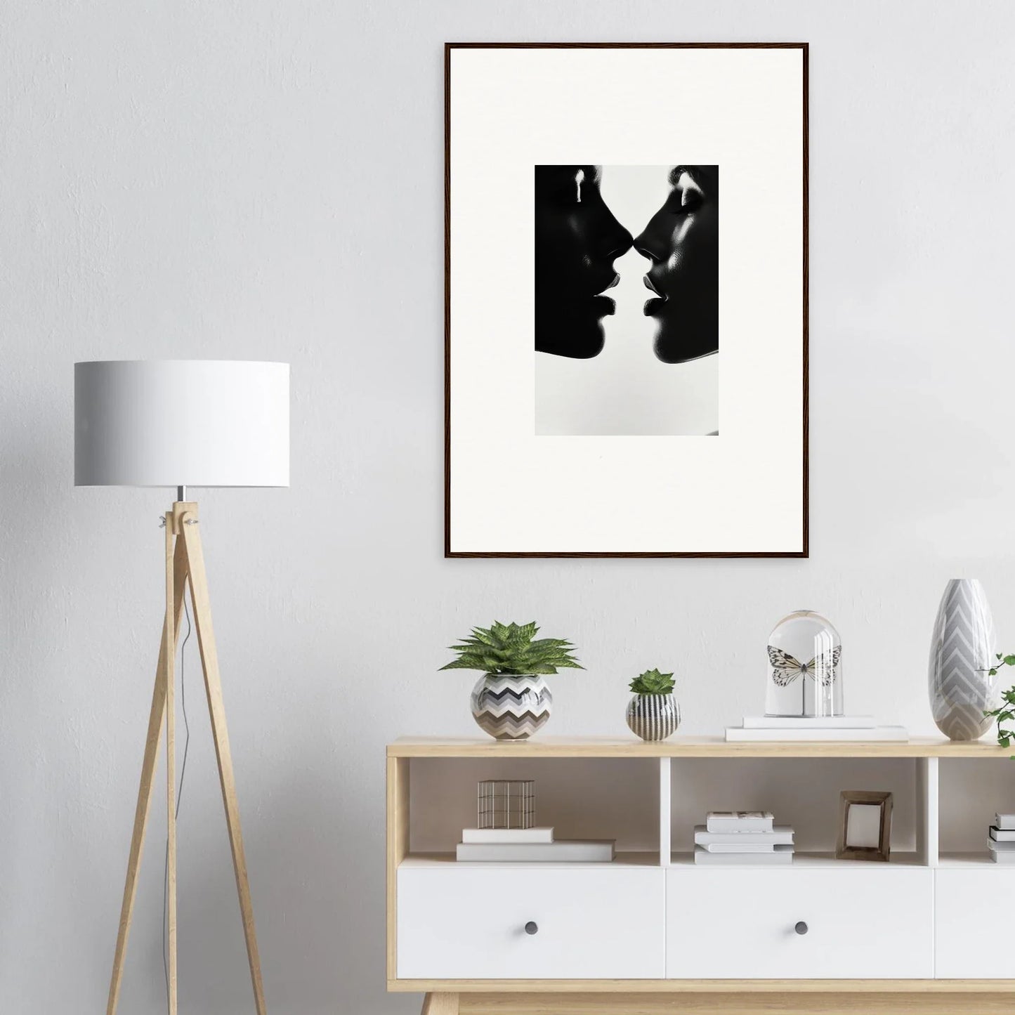 Black and white silhouette art of two profiles for Eclipsing Soulcare Kisses