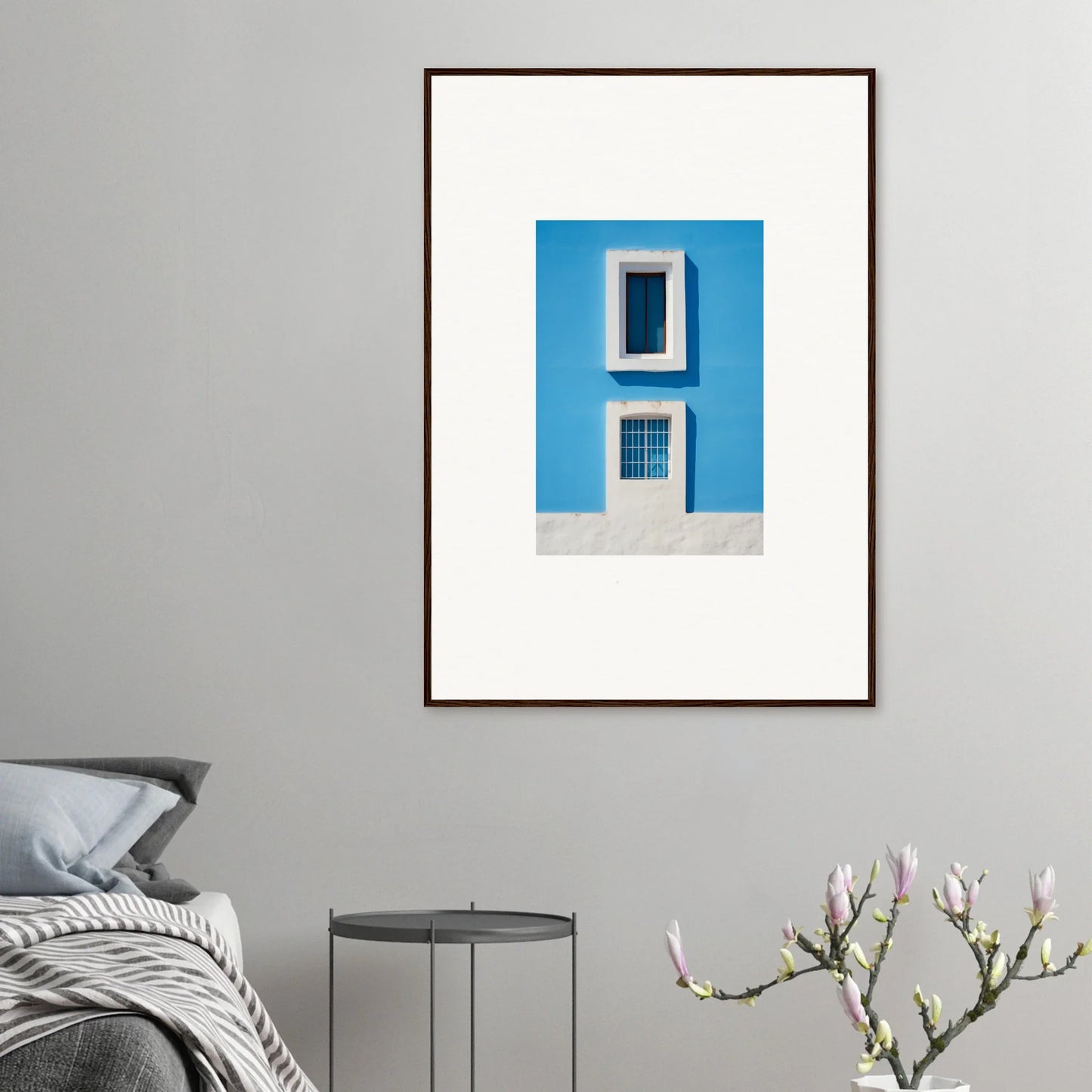 Framed wall art of white windows on a blue wall from Isles Encompassed Vista collection