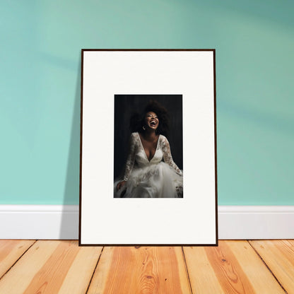 Framed black and white photo of joyful woman in white dress for Timeless Essence Laughter