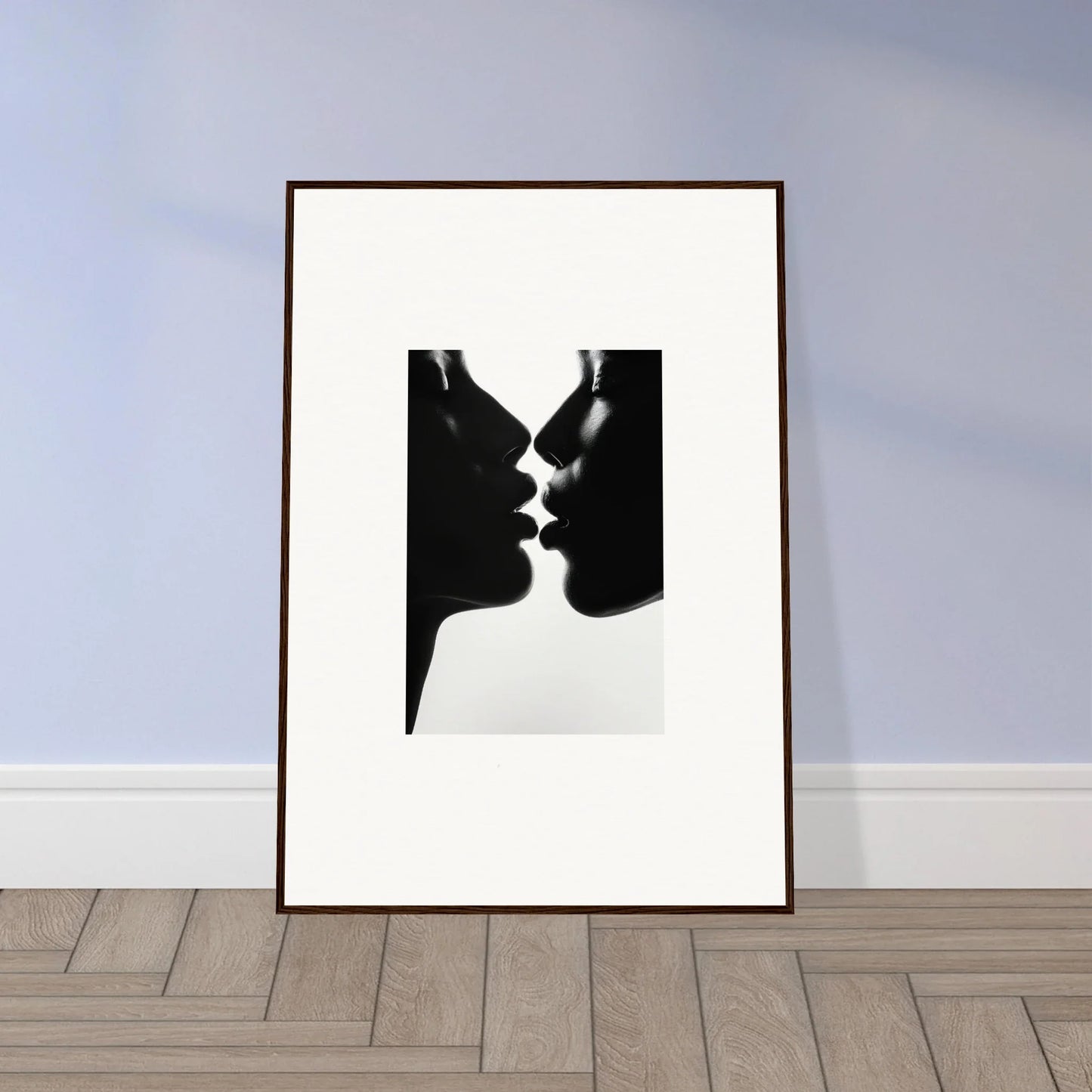 Black and white silhouette of two profiles about to kiss for Luminous Midnight Kiss framed wall art