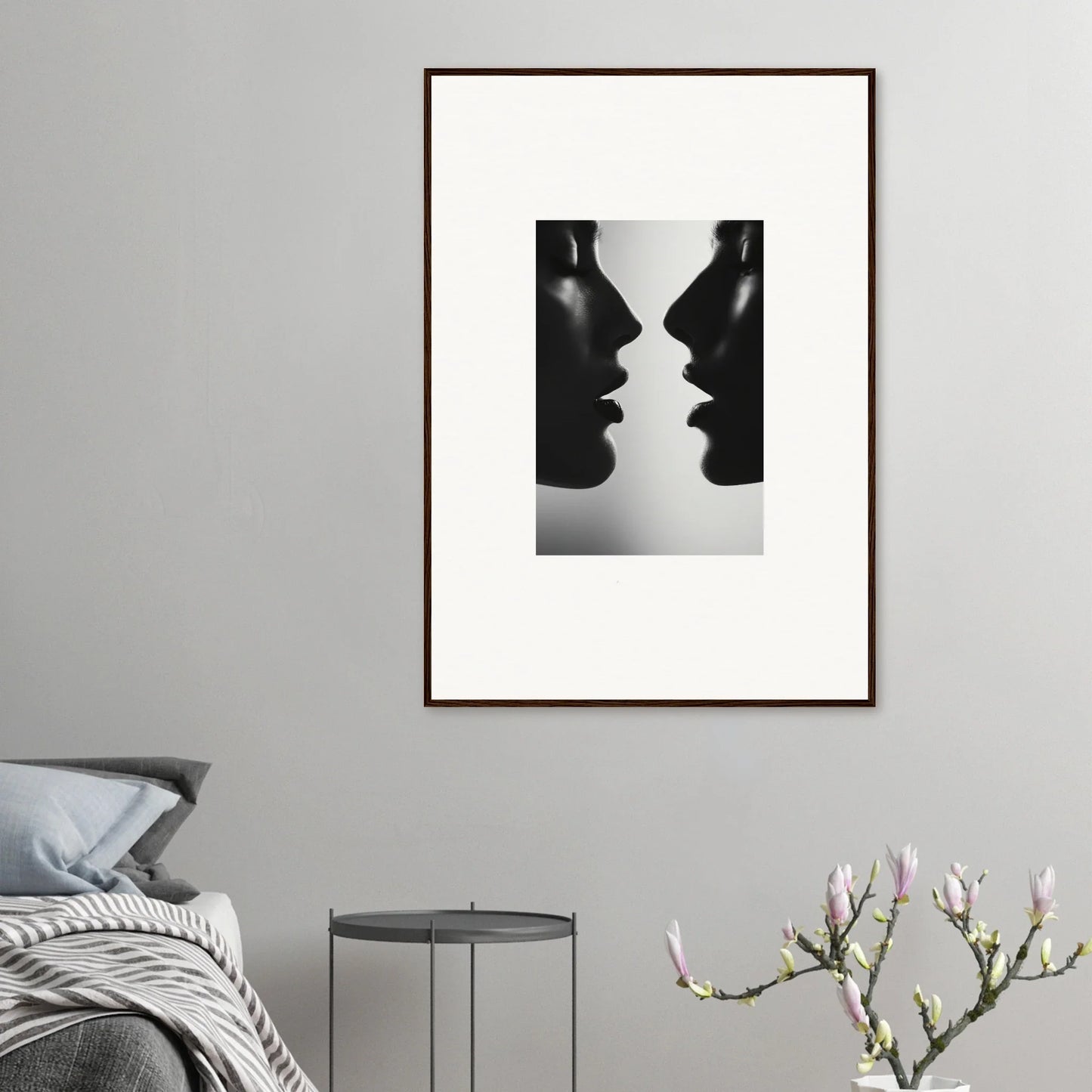 Framed black and white photo of two silhouetted profiles for Symbiotic Echoes Flutter