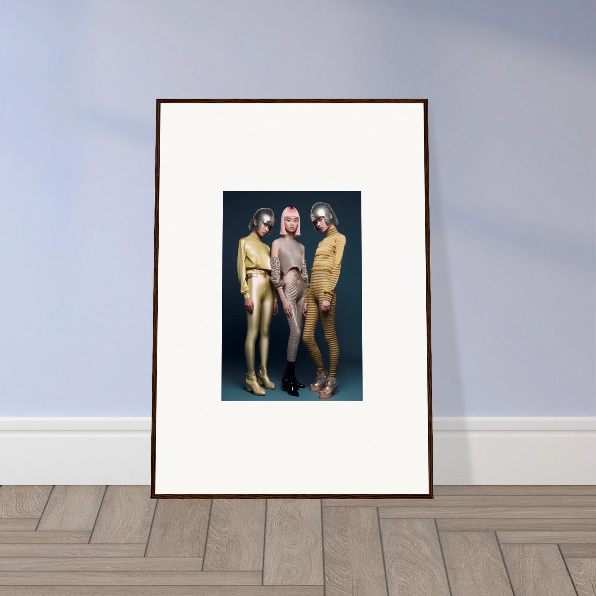 Framed wall art of three people in yellow and beige bodysuits for Galactic Fashion Paradigm