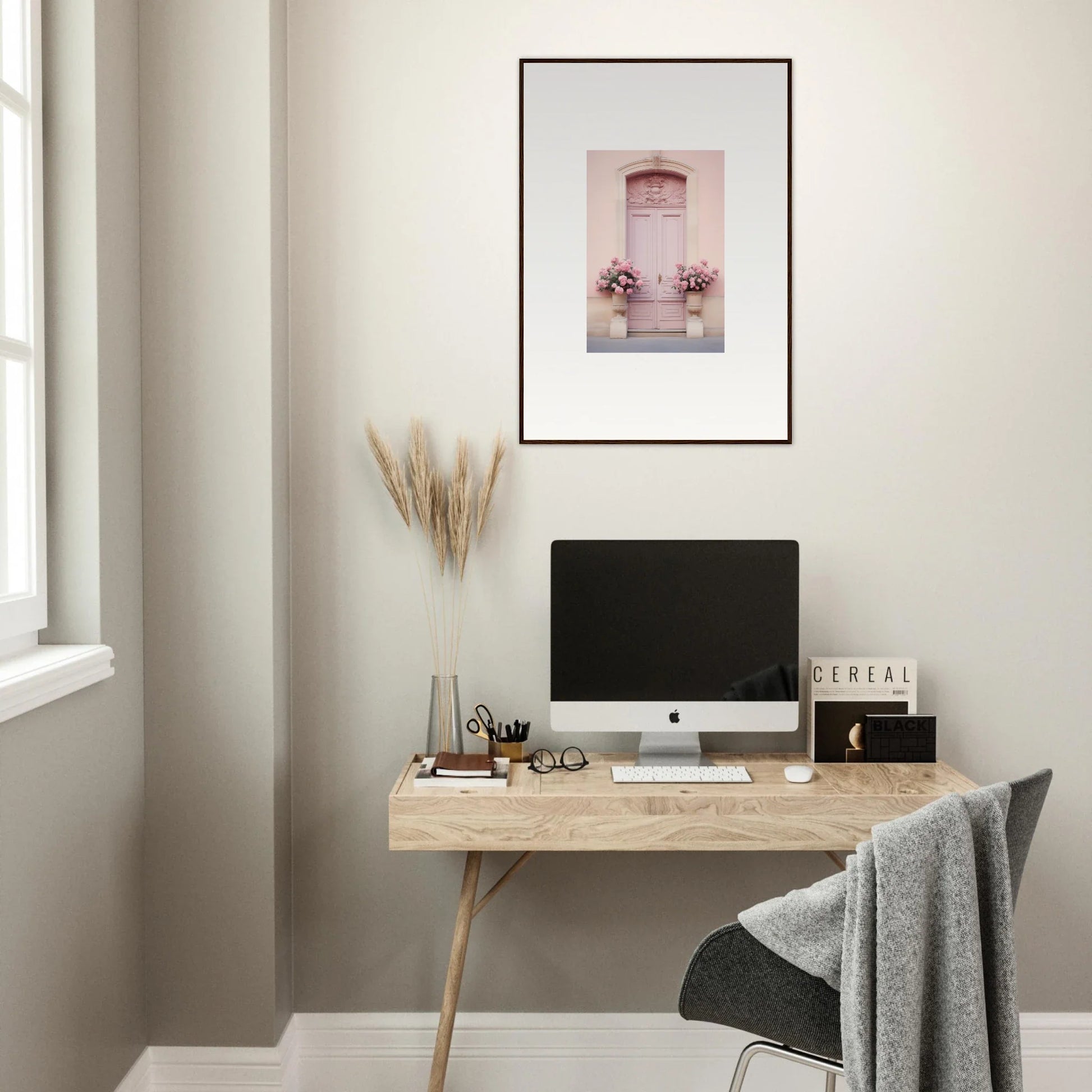 Minimalist wooden desk with iMac and framed wall art from Rosy Cosmos Gateway