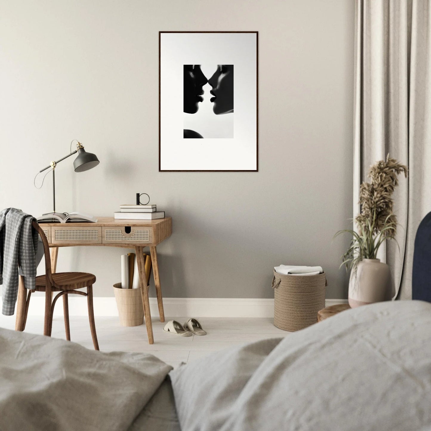 Minimalist black and white couple kissing silhouette in premium framed wall art