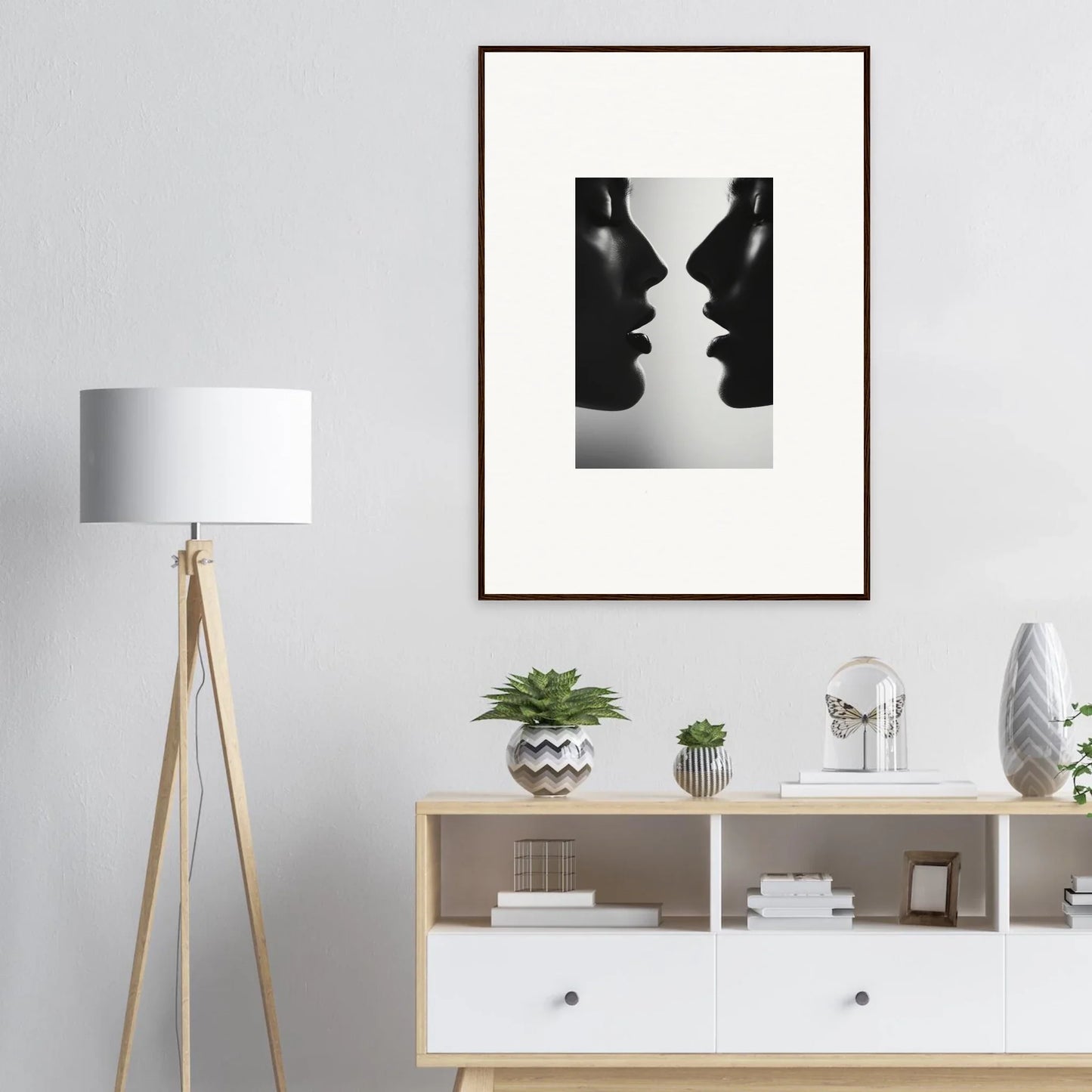 Black and white framed art print of silhouetted profiles for Symbiotic Echoes Flutter