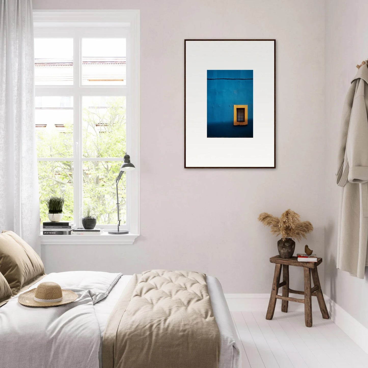 Minimalist bedroom featuring Hypercolor Dreamscape Longitude with blue framed artwork