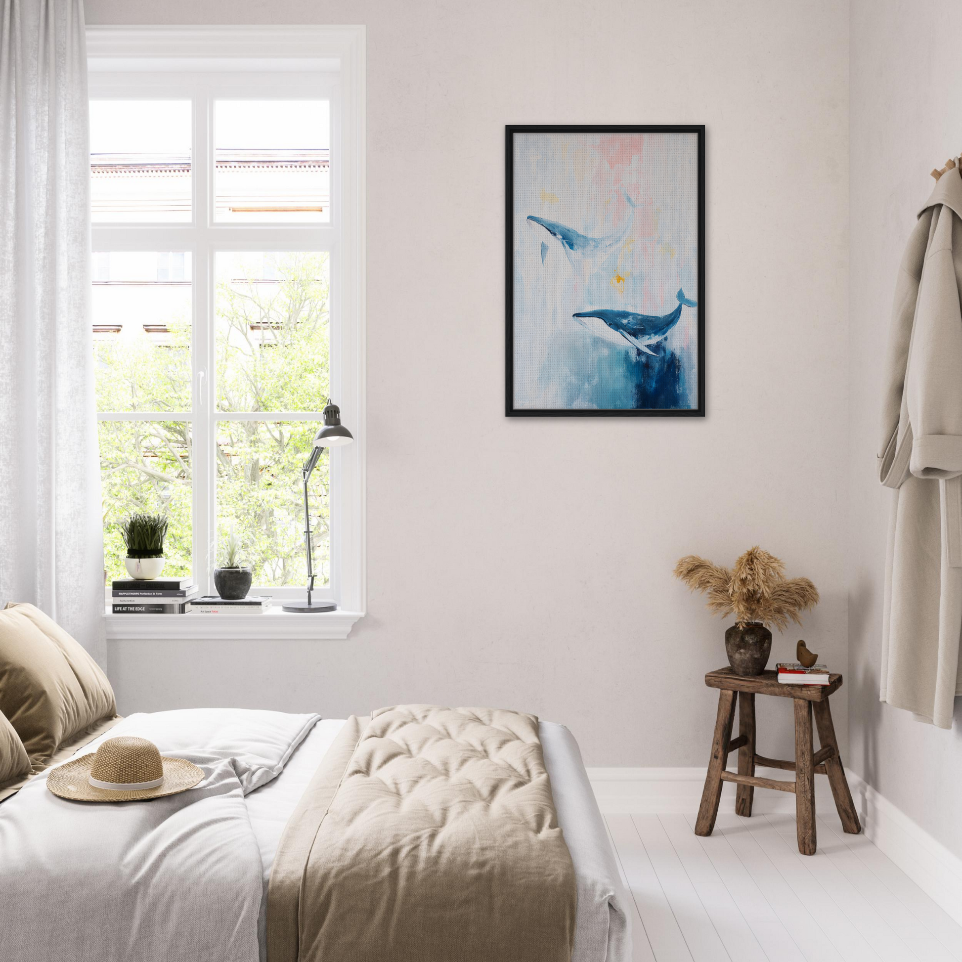 Bright, airy bedroom with white decor featuring Whales Blue Beatitude artwork