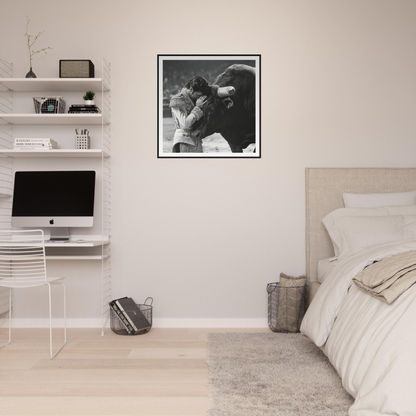 Minimalist bedroom showcasing Whispers of Confrontation framed wall art and sleek iMac