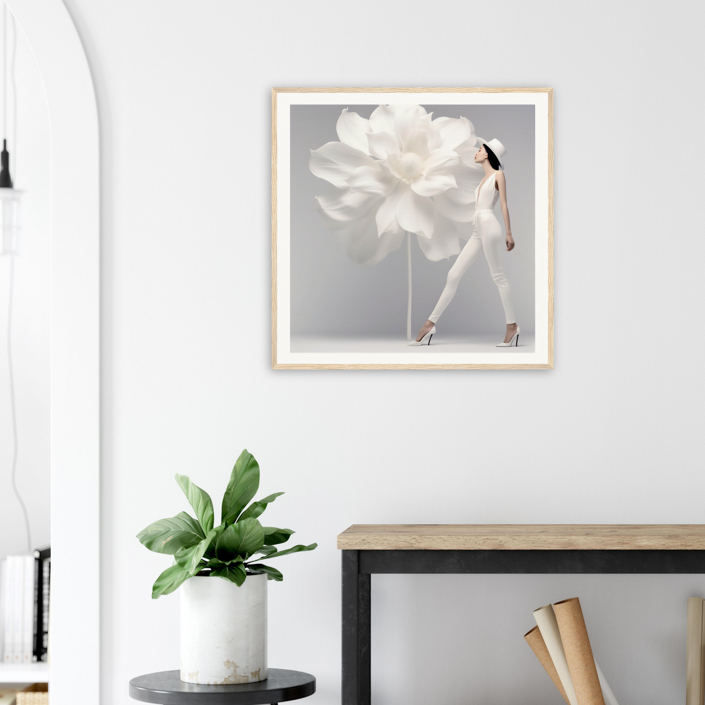 Framed artwork depicting a ballerina’s legs emerging from a white flower-like tutu.