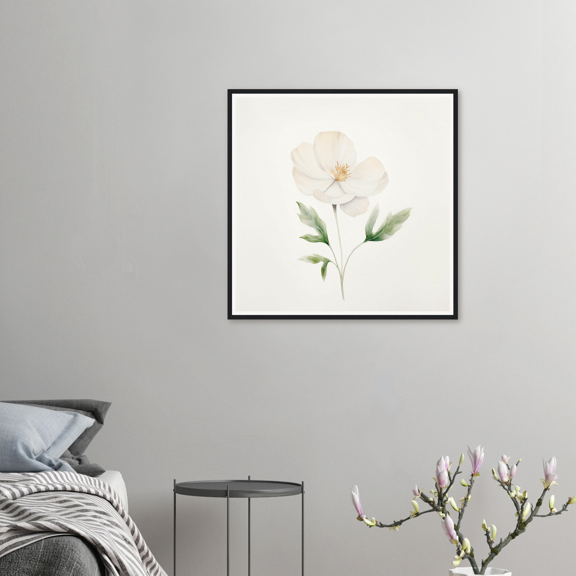 A white flower with green leaves on a white background