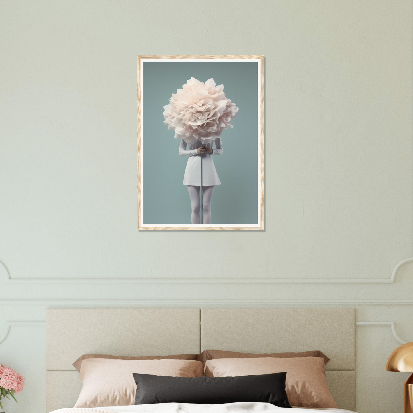 Framed artwork depicting a figure with a giant floral bloom for a head.