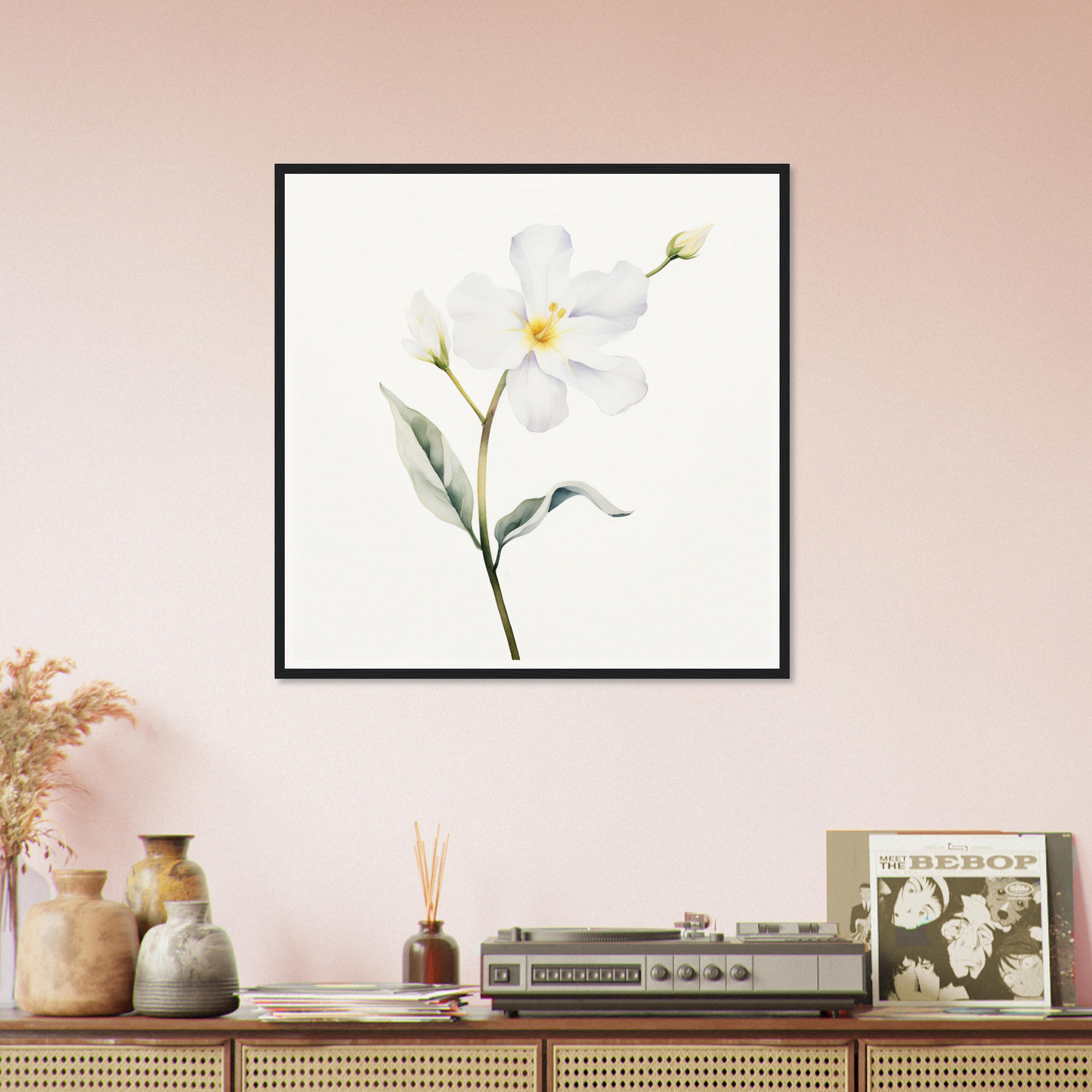 A white flower on a pink wall