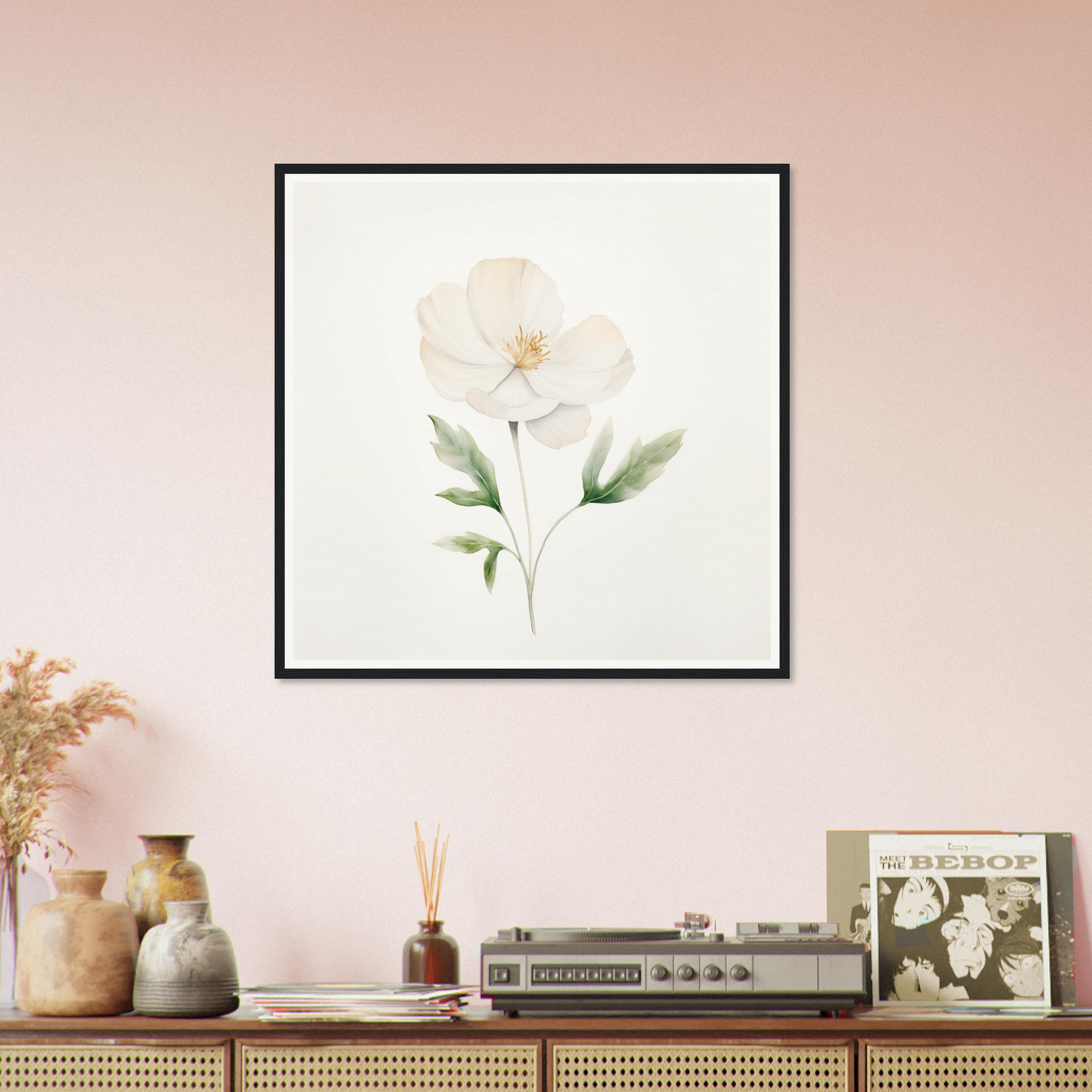 A white flower on a pink wall