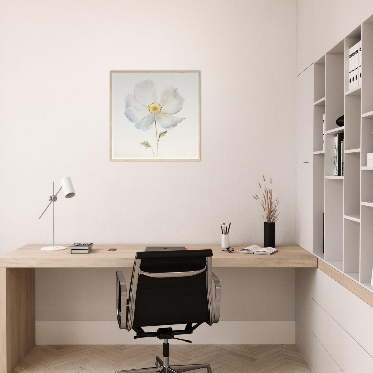 A white flower on a white wall above a desk