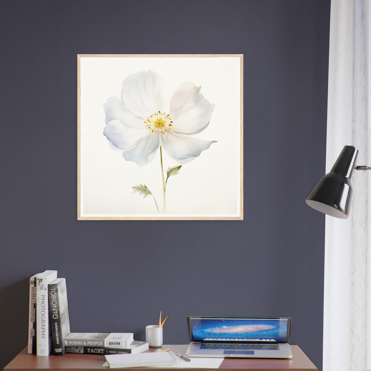 A white flower on a wall above a desk