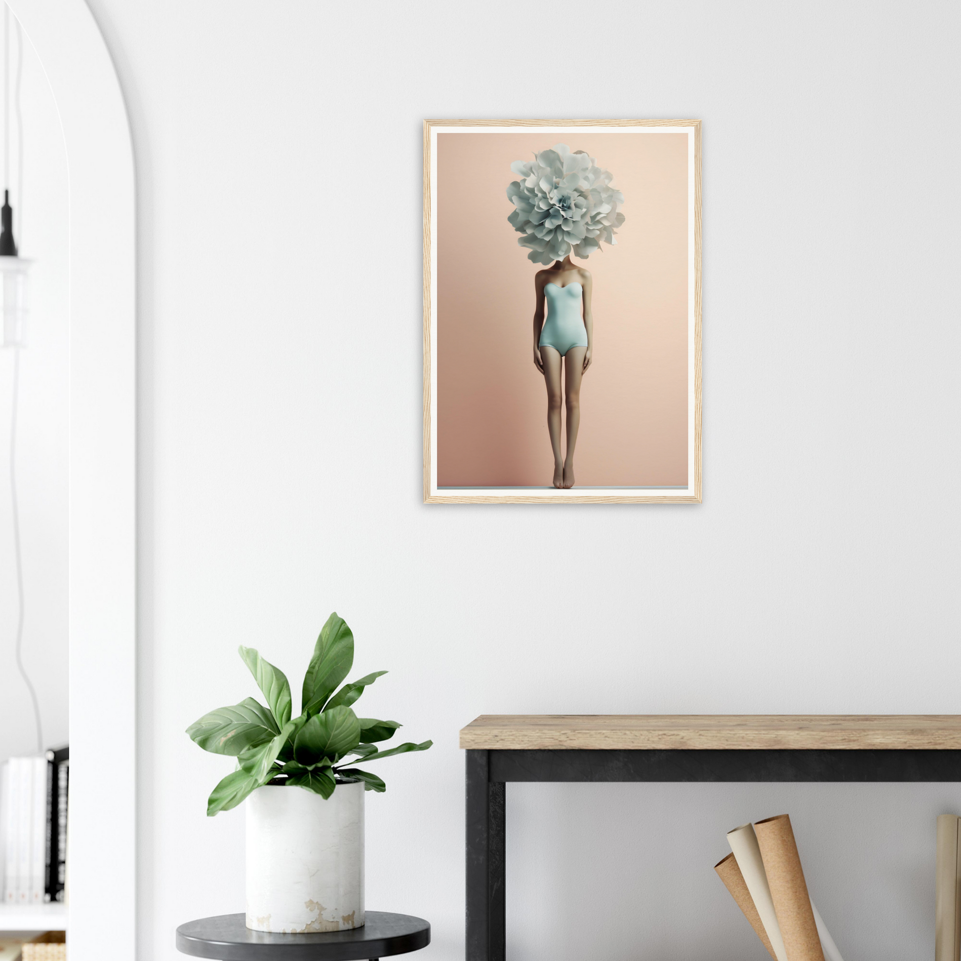 Framed surrealist artwork depicting a figure with a blue-green succulent plant as a head, wearing a light blue swimsuit.