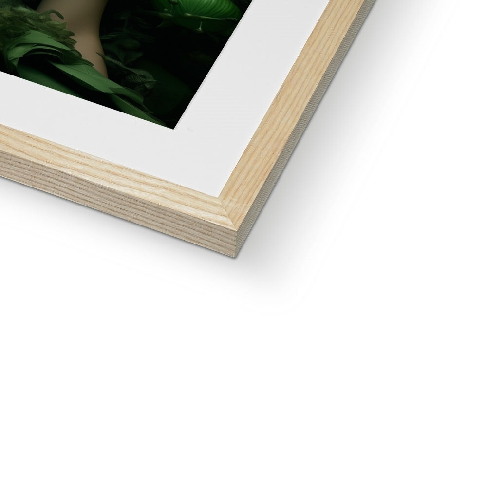 A white frame with a green plant in it