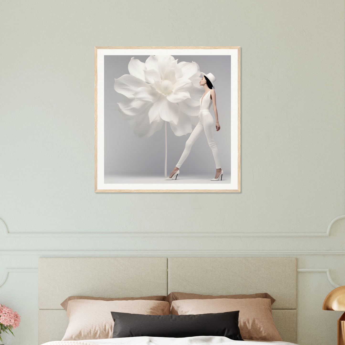 Framed artwork depicting a figure in a flowing white dress with dramatic movement.