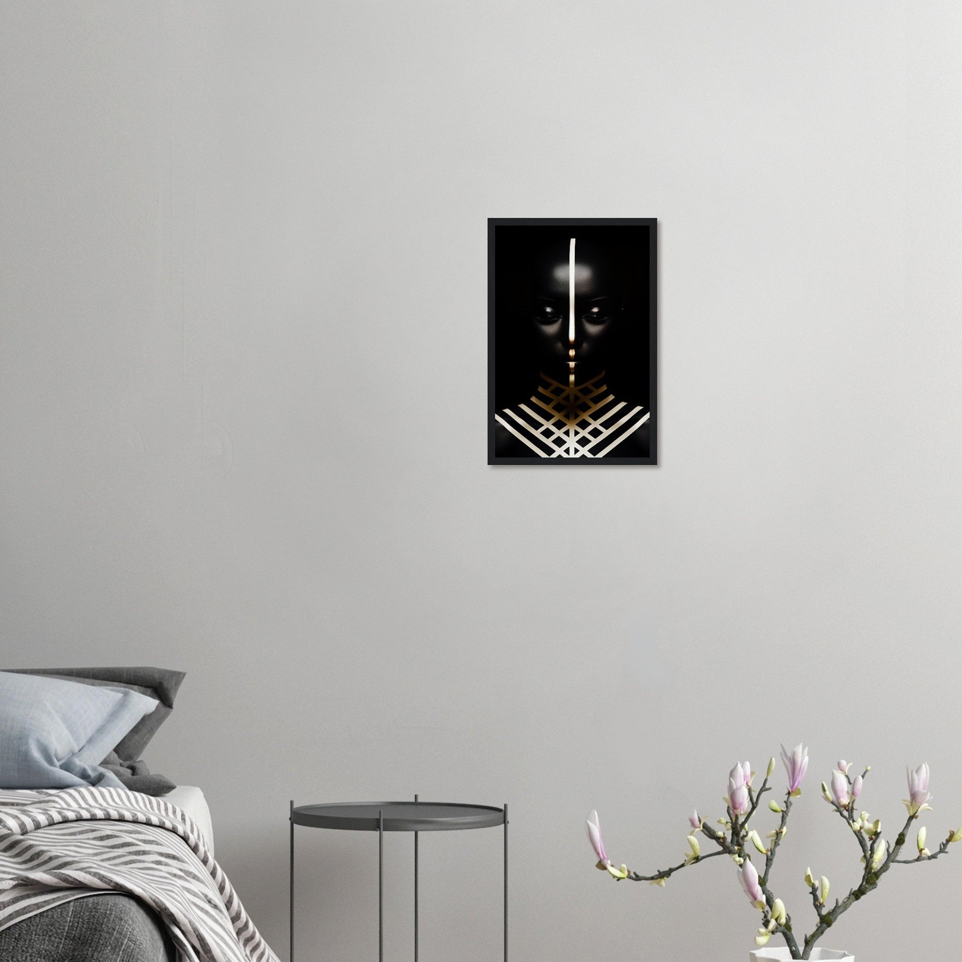 Black and white framed artwork featuring a stylized sword or blade with geometric patterns.