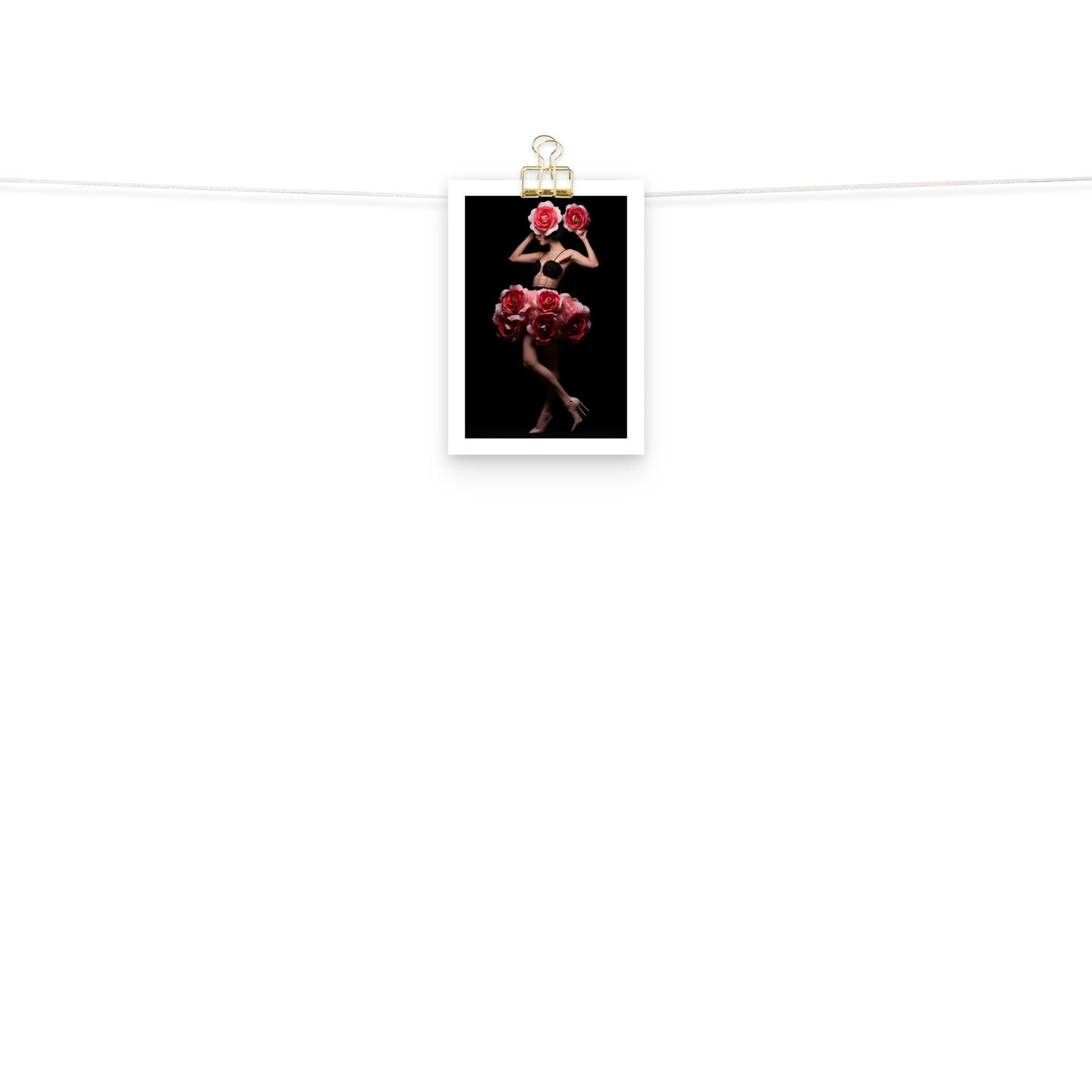 A white sheet with a red ballerina on it