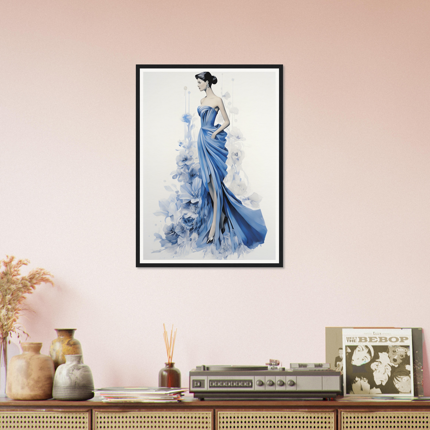 A woman in a blue dress with a flower in her hair framed on a wall