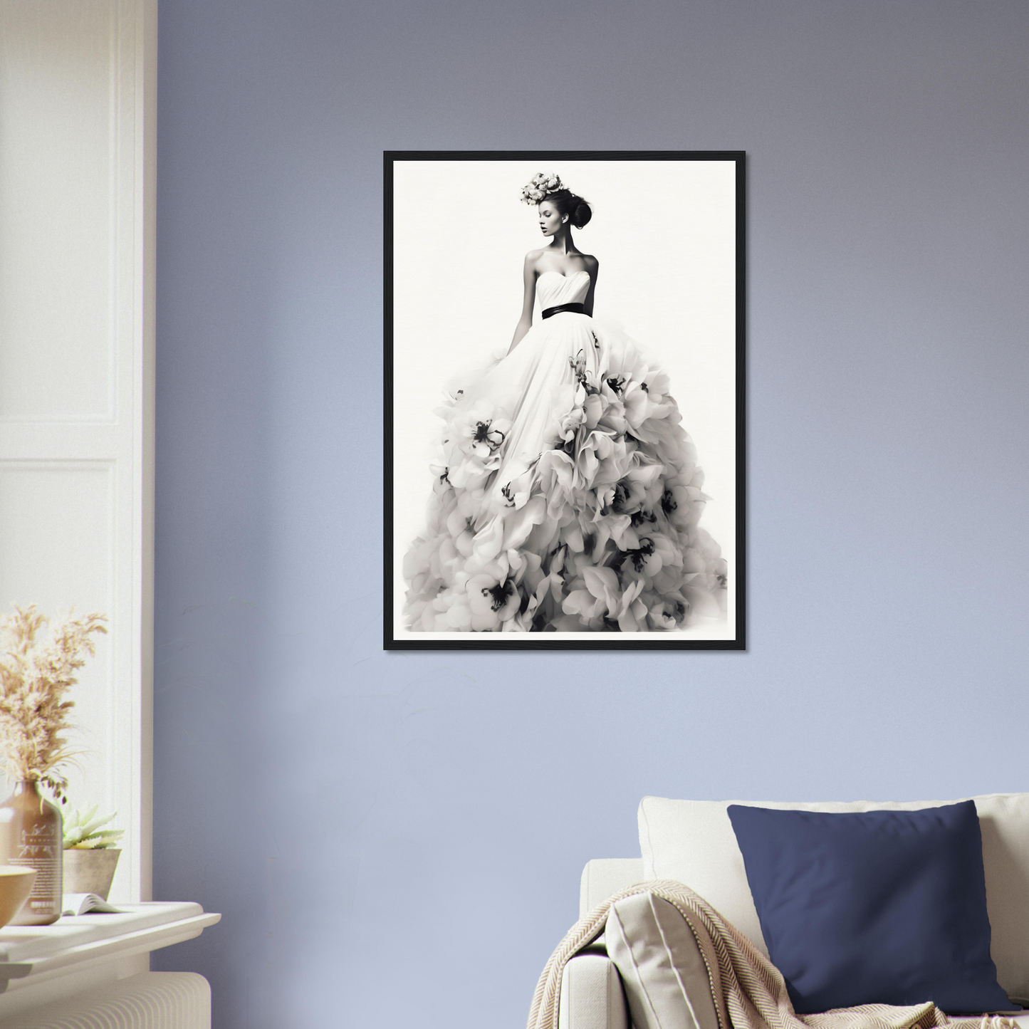 A woman in a dress with flowers on her head and a bouquet in her hand framed in a living room