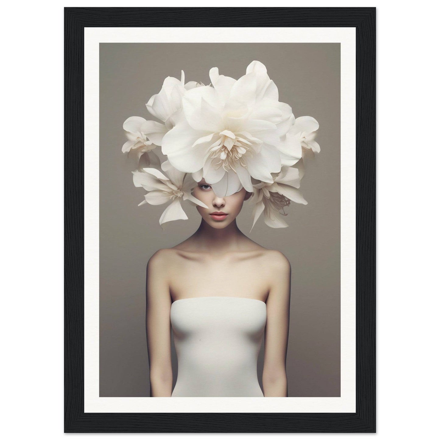 A woman with a large white flower in her hair