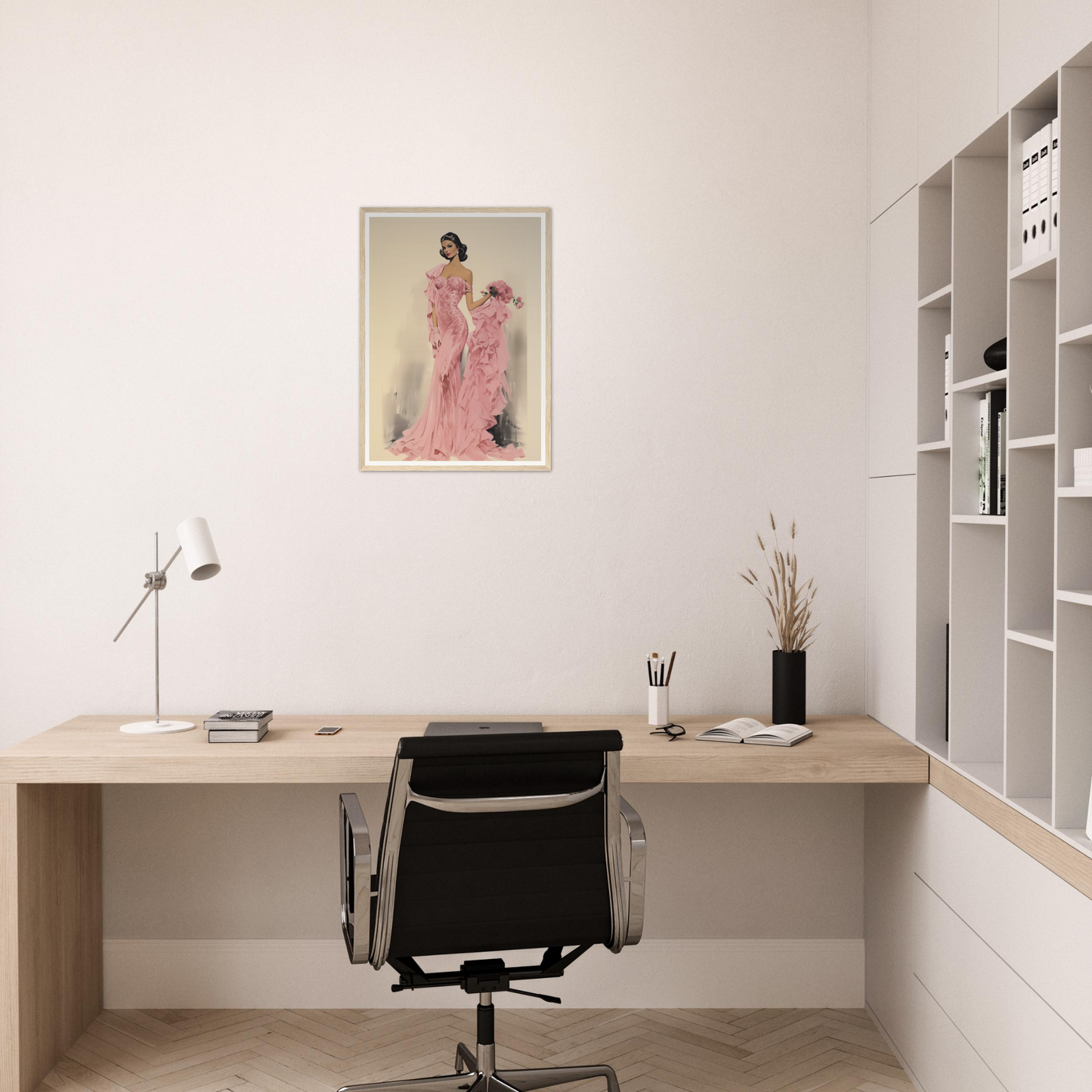 A woman in a pink dress sitting at a desk