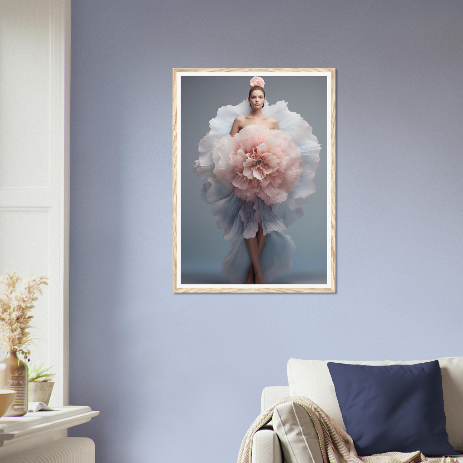 A woman in a pink dress with a large flower in her hand