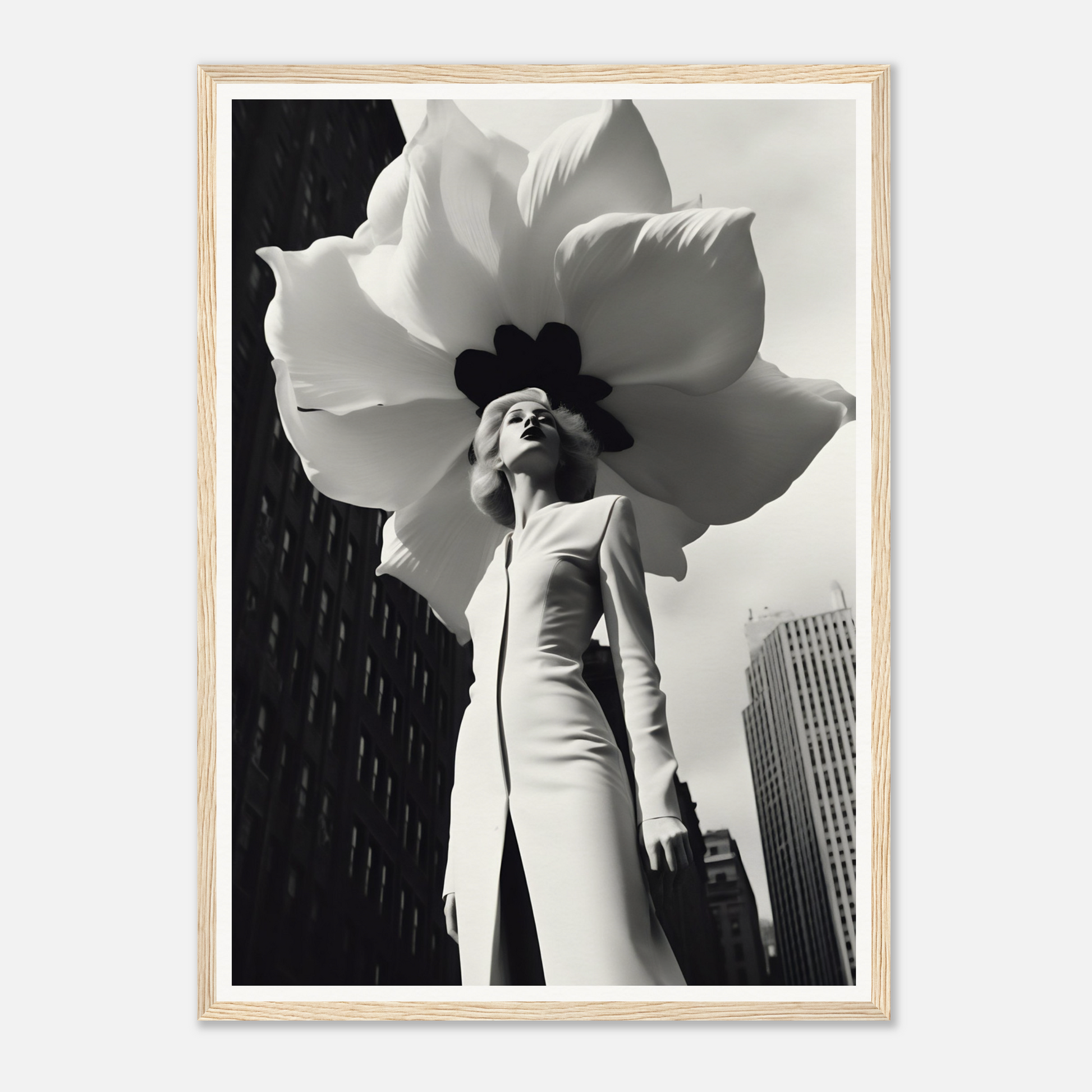 A woman in a white dress and hat holding a large flower