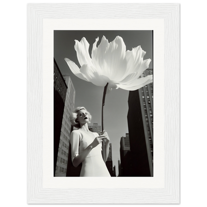 A woman in a white dress holding a large white flower