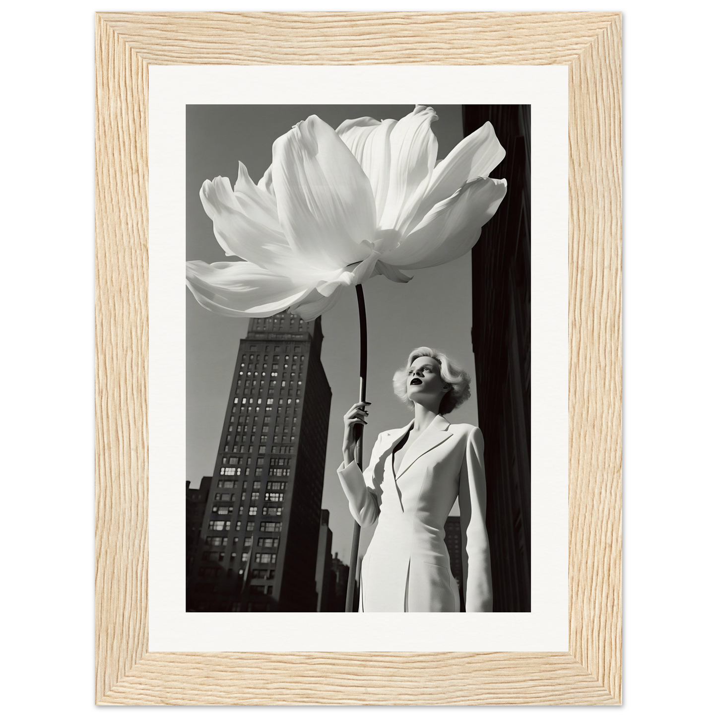 A woman in a white dress holding a large white flower