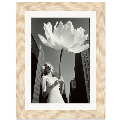 A woman in a white dress holding a large white flower