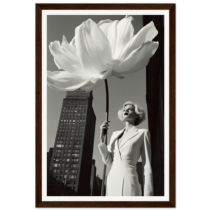 A woman in a white dress holding a large white flower