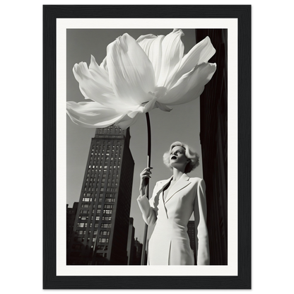 A woman in a white dress holding a large white flower