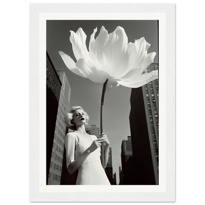 A woman in a white dress holding a large white flower