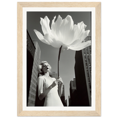 A woman in a white dress holding a large white flower