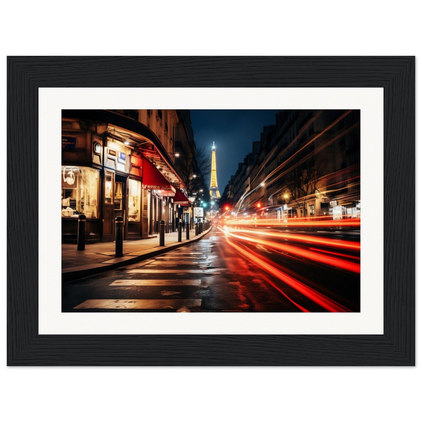 Framed photograph of a Parisian street at night with the illuminated Eiffel Tower visible in the distance.