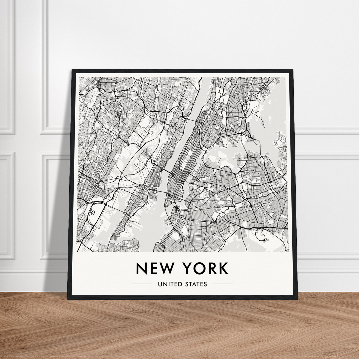 Framed black and white map of New York City’s street layout.